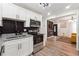 Open concept kitchen with granite countertops and stainless steel appliances at 2082 Perkerson Sw Rd, Atlanta, GA 30310