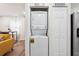 Stacked washer and dryer in dedicated laundry closet at 2082 Perkerson Sw Rd, Atlanta, GA 30310