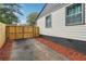 Side yard with wood fence and gate at 2082 Perkerson Sw Rd, Atlanta, GA 30310