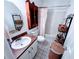 Clean bathroom with a shower/tub combo and updated vanity at 32 Peachtree Nw St # 1704, Atlanta, GA 30303