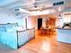 Bright bedroom with hardwood floors and a metal bed frame at 32 Peachtree Nw St # 1704, Atlanta, GA 30303
