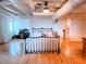 Large bedroom with hardwood floors and a metal bed frame at 32 Peachtree Nw St # 1704, Atlanta, GA 30303