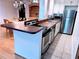 Modern kitchen with stainless steel appliances and granite countertops at 32 Peachtree Nw St # 1704, Atlanta, GA 30303