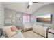 Charming bedroom with a whimsical design, bright decor, and ample play space at 5534 Radford Loop, Fairburn, GA 30213
