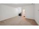 Spacious bonus room with carpeted floor and an adjacent bathroom at 5534 Radford Loop, Fairburn, GA 30213