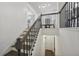 Elegant staircase leading to the second floor at 5534 Radford Loop, Fairburn, GA 30213
