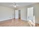 Spacious primary bedroom with hardwood floors and ensuite access at 1890 Tribble Ridge Dr, Lawrenceville, GA 30045