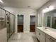 Main bathroom with a large shower and double vanity at 730 Lanarck Way, Peachtree City, GA 30269