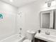 Updated bathroom with bathtub, toilet and vanity at 8298 Holly Dr, Jonesboro, GA 30238