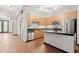 Modern kitchen with stainless steel appliances and wood cabinets at 5300 Peachtree Rd # 3510, Chamblee, GA 30341