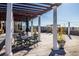 Relaxing rooftop patio with pergola, seating and string lights at 5300 Peachtree Rd # 3510, Chamblee, GA 30341
