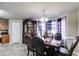 A formal dining room with a large table and hutch at 674 Fairview Dr, Dallas, GA 30157