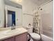 Bathroom with toilet, shower/tub combo, and vanity at 851 Louisa Ln, Lithonia, GA 30058