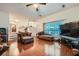 Comfortable living room with hardwood floors and large windows at 851 Louisa Ln, Lithonia, GA 30058