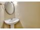 Clean bathroom with pedestal sink and an oval mirror at 103 Linton Dr # 1, Acworth, GA 30102