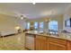 Open kitchen with granite counters, stainless appliances, and breakfast bar at 103 Linton Dr # 1, Acworth, GA 30102