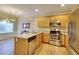 L-shaped kitchen with granite countertops and stainless steel appliances at 103 Linton Dr # 1, Acworth, GA 30102
