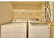 Laundry room with washer, dryer and shelving at 103 Linton Dr # 1, Acworth, GA 30102