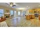 Open living space with tile floors, fireplace, and kitchen access at 103 Linton Dr # 1, Acworth, GA 30102