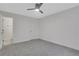 Spacious bedroom with ceiling fan and access to en-suite bathroom at 1412 Tuxworth Cir, Decatur, GA 30033