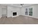 Living room with hardwood floors, fireplace and access to balcony at 1412 Tuxworth Cir, Decatur, GA 30033