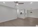 Open living room with hardwood floors and ceiling fan at 1412 Tuxworth Cir, Decatur, GA 30033
