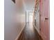 Hallway with hardwood floors and neutral-colored walls at 2812 Highway 16 E, Sharpsburg, GA 30277