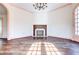 Living room featuring hardwood floors and a fireplace at 2812 Highway 16 E, Sharpsburg, GA 30277