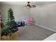 Bright bedroom featuring gray carpet and a ceiling fan at 2922 Eleanor Ter, Atlanta, GA 30318