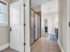 Bathroom includes tiled floors, a glass shower, and doorway to bedroom at 1004 Fairway Seven, Villa Rica, GA 30180