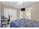 Bedroom with double closet doors and bathroom access, including a work space at 1004 Fairway Seven, Villa Rica, GA 30180