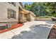 Spacious driveway leading to a garage and charming home exterior at 1004 Fairway Seven, Villa Rica, GA 30180