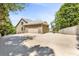 Large, multi-car garage of home with basketball hoop and expansive concrete drive at 1004 Fairway Seven, Villa Rica, GA 30180