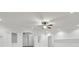 Bright and spacious living room featuring an archway, recessed lighting, decorative molding and a ceiling fan at 1004 Fairway Seven, Villa Rica, GA 30180