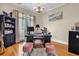 Bright office with hardwood floors, built-in shelving, and a functional workspace at 1004 Fairway Seven, Villa Rica, GA 30180