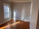 Bright bedroom with hardwood floors and a large window at 2119 Gorman Se Grv # 126, Atlanta, GA 30316