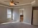 Main bedroom with bathroom access and a large window at 2119 Gorman Se Grv # 126, Atlanta, GA 30316