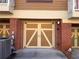 Double-car garage with tan doors and brick exterior at 2119 Gorman Se Grv # 126, Atlanta, GA 30316