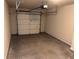 Empty garage with automatic garage door at 2119 Gorman Se Grv # 126, Atlanta, GA 30316