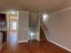 Hardwood floor hallway with staircase leading upstairs at 2119 Gorman Se Grv # 126, Atlanta, GA 30316