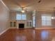 Living room with hardwood floors, fireplace and built-in shelving at 2119 Gorman Se Grv # 126, Atlanta, GA 30316