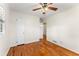 Well-lit bedroom featuring hardwood floors and ample closet space at 4032 E Hilda Cir, Decatur, GA 30035