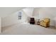 Lofted bonus room space with ample natural light and seating area at 300 Huntington St, Covington, GA 30016