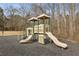 Well-equipped community playground with slides and interactive features for entertainment at 300 Huntington St, Covington, GA 30016