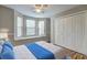 Bright bedroom with large window, built-in shelving and spacious closet at 105 Ardenlee Dr, Peachtree City, GA 30269