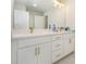 Modern bathroom with double vanity and stylish light fixtures at 1756 Evenstad Way, Smyrna, GA 30080