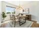 Elegant dining room, hardwood floors, and a wood dining table at 1756 Evenstad Way, Smyrna, GA 30080