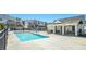 Community pool with adjacent clubhouse and seating at 1756 Evenstad Way, Smyrna, GA 30080