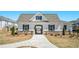 Community clubhouse and pool with brick accents at 1756 Evenstad Way, Smyrna, GA 30080
