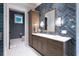 Modern bathroom with herringbone tile and wood vanity at 3244 Stillhouse Rd, Atlanta, GA 30339
